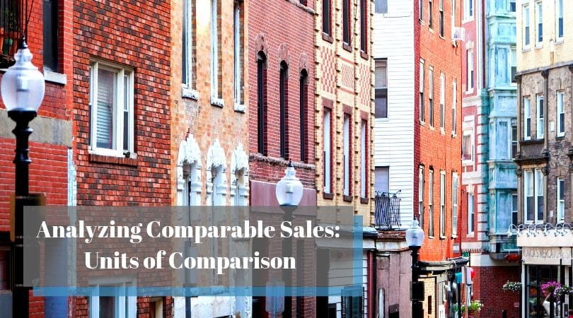 Appraiser analyzing property data for comparable sales.