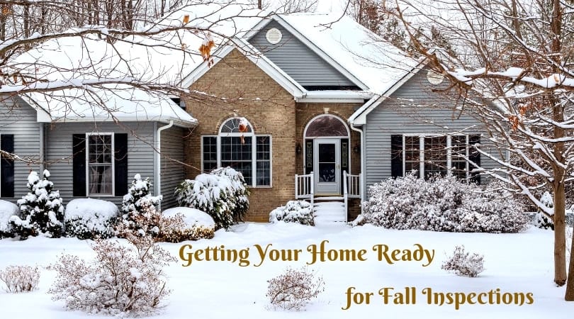 A cozy home exterior with fall foliage, symbolizing seasonal home inspection readiness.