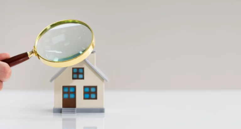 Real estate appraiser reviewing property documents in Massachusetts